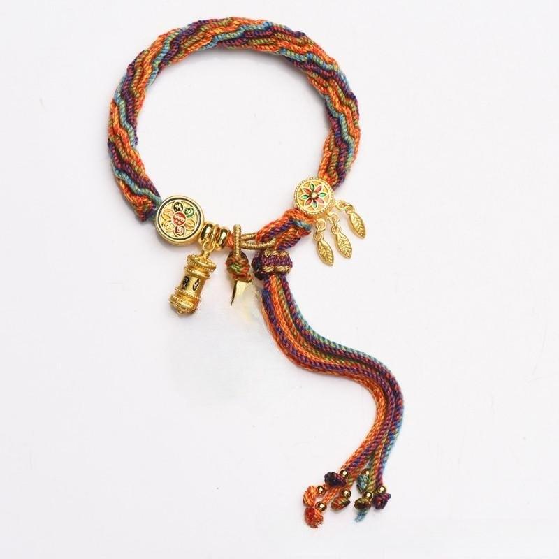 Detailed view of the vibrant woven cord, showcasing intricate patterns and vibrant colors typical of Tibetan craftsmanship.
